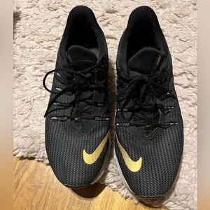 Nike Woman’s Quest Black with Metallic Gold Swoosh Running Shoes. Size 11.